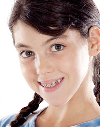 smiling girl with braces